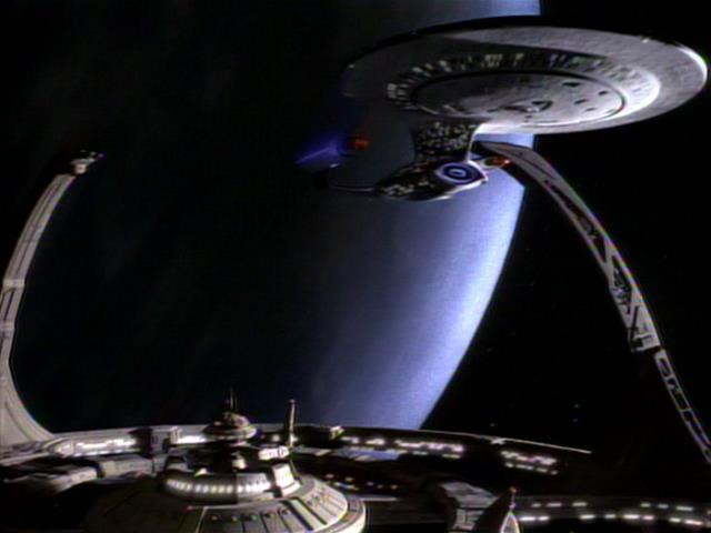 Enterprise docks at DS9 in orbit of Bajor