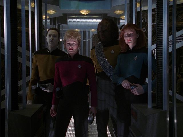 The away team attempts to rescue Picard