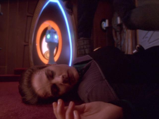Dax falls to the ground after Dukat's attack