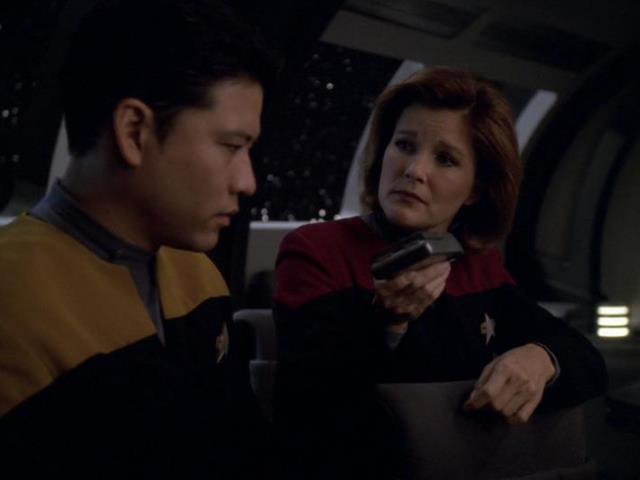 Janeway gives Harry a message from the future