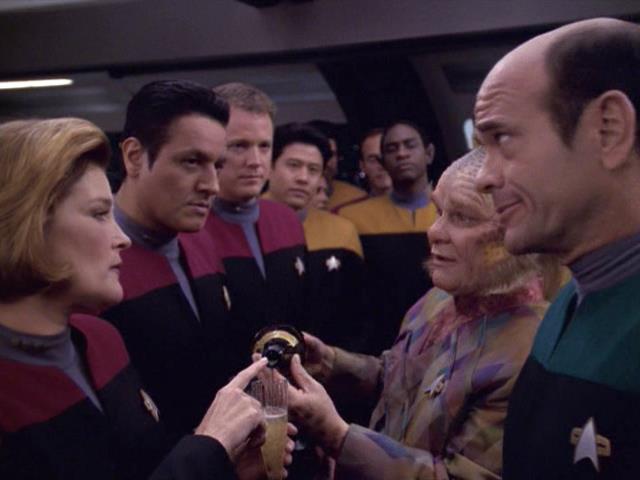 The Voyager crew toasts Lt. Barclay